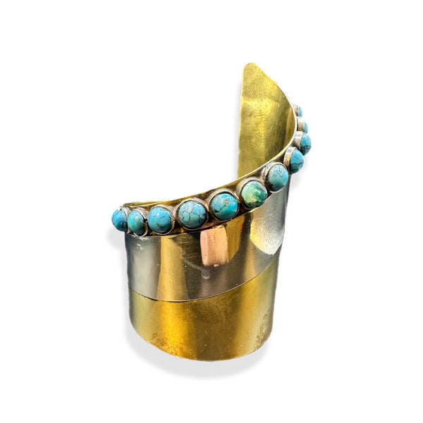 Brazalete con punta de flecha turquesa retorcida